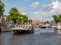 Motorboats seeking mooring in Het Dok canal, Lemmer, Friesland, Netherlands