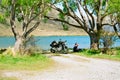 Motorcyce rider near lake Royalty Free Stock Photo