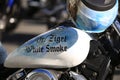 Motorcycle airbrush. A blue and white fuel tank with name close-up Royalty Free Stock Photo
