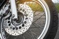 Motorcycle brake disc on a wheel close-up Royalty Free Stock Photo