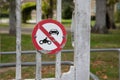 Motorcycle and car prohibited traffic road sign No motorbike auto no parking panel red white front gate street Royalty Free Stock Photo