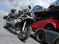 Motorcycle and cars Royalty Free Stock Photo