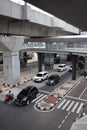 Motorcycle and cars are riding on street at CSW ASEAN integrated station from Trunojoyo street. Jakarta, Indonesia, December 16,