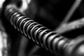 Motorcycle spring in macro, black and white. Artsy.