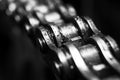 Motorcycle chain in macro, black and white. Artsy.