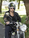 Motorcycle rider with helmet