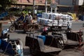 Motorcycle contractor Drag the cargo wheels that bulk cargo Thai-Cambodian border. Royalty Free Stock Photo