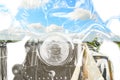 Motorcycle and country road in double exposure