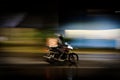 Night motorcycle delivery rider