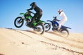 Motorcycle, desert dune and fast in race, contest or outdoor hill climb for performance, goal or off road. Motorbike