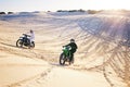 Motorcycle, desert dune and race for speed, competition or outdoor hill for performance, goal or off road. Motorbike