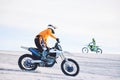 Motorcycle, desert and moto sport fitness with men outdoor on hill with race, journey and adventure. Extreme, sand and