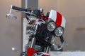 Motorcycle with double headlights eye-like sad robot on the show Royalty Free Stock Photo