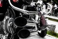 Motorcycle, double tailpipe. Rear view. Artistically discolored photo. Bikers. Motor style Royalty Free Stock Photo