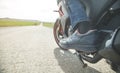 Motorcycle driver riding alone on asphalt motorway