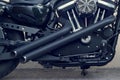 Motorcycle engine close-up detail on street background Royalty Free Stock Photo