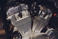 Motorcycle engine, metallic background with exhaust pipes. Royalty Free Stock Photo