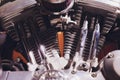 Motorcycle engine, metallic background with exhaust pipes. Royalty Free Stock Photo