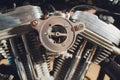 Motorcycle engine, metallic background with exhaust pipes. Royalty Free Stock Photo