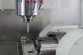 The motorcycle engine parts cutting by 4-axis CNC milling machine Royalty Free Stock Photo