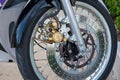 Motorcycle front wheel, tire, brake Royalty Free Stock Photo