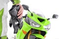 Motorcycle gloves with carbon and bike Royalty Free Stock Photo