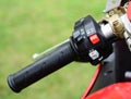 Motorcycle handle photographed outdoors