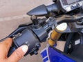 Motorcycle headlight, turn signal and horn button.