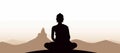 Black silhouette of the Buddha sitting on the mountain. Royalty Free Stock Photo