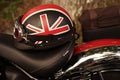 Motorcycle with a helmet featuring a British flag design