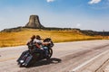 Motorcycle passing Devil`s Tower, Wyoming Royalty Free Stock Photo
