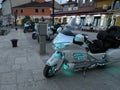 Motorcycle isolated.Heavy motor, a motorcycle with open lights,by the Adriatic Sea on a rocky, tiled pier at the port of boats. Th
