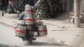 Motorcycle with metal cans, Hanoi, Vietnam