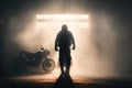 Motorcycle and motorcyclist silhouette in empty space with concrete floor, filled with fog.