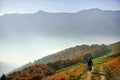 Motorcycle on a mountain dirt road in autumn Royalty Free Stock Photo