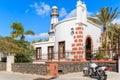 Motorcycle parked in front of typical church Royalty Free Stock Photo