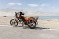 Motorcycle parked at the Karakorum Highway Royalty Free Stock Photo