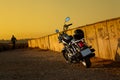 Motorcycle parked at sunset Royalty Free Stock Photo