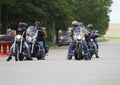 Motorcycle Poker Run Riders on a street talking
