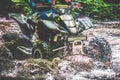 Motorcycle quad bike crossing water Royalty Free Stock Photo