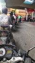 the motorcycle queue to buy very long fuel