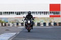 A motorcycle racer takes a practice run on a sports track Royalty Free Stock Photo