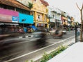 Motorcycle and rickshaw rushing during traffic