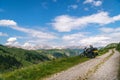 Motorcycle rider enjoy the momment. Touring adventure motorbike on the top of mountain, enduro, off road, beautiful view, danger