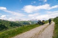 Motorcycle rider enjoy the momment. Touring adventure motorbike on the top of mountain, enduro, off road, beautiful view, danger Royalty Free Stock Photo