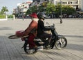 Motorcycle rider sits backwards