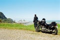 Motorcycle rider viewing ocean Royalty Free Stock Photo