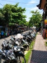 Motorcycle and scooter parking near the market Denpasar Royalty Free Stock Photo