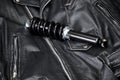 Motorcycle shock on leather biker jacket