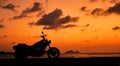 Motorcycle silhouette at sunset time